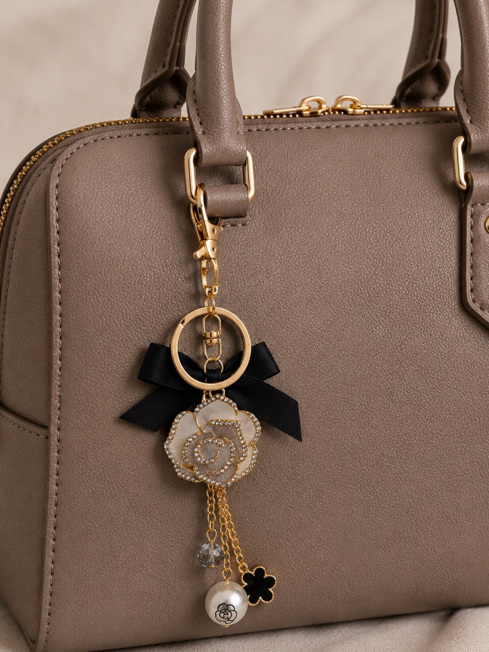 Luxury Inspired Gold-tone Black Bow & Floral Bag Charm